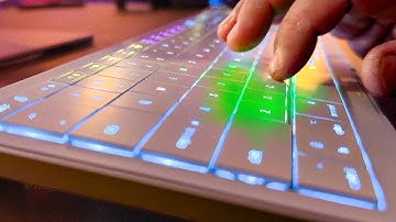 Innovative Wireless RGB Keyboard with Built in Track Pad and touch controls! Clevetura CLVX 1