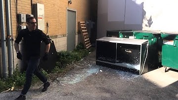 Sledge Hammer Breaking Glass In Slow Motion