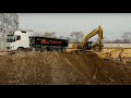 Volvo FH and Cat excavator