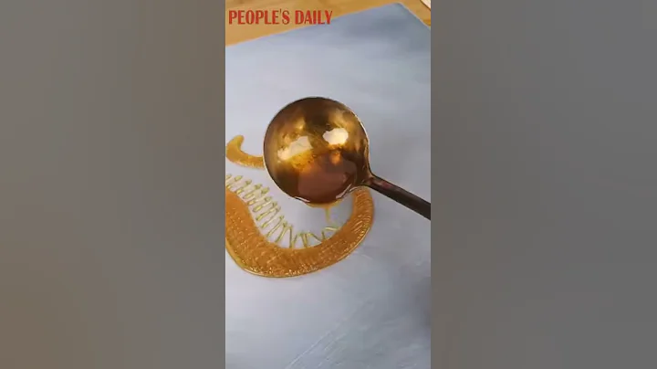 A sugar-painting artist from Ningbo brings to life a Chinese dragon with liquid sugar - 天天要闻