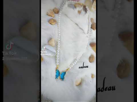 عقد لولي ابيض بفراشه كرستال
