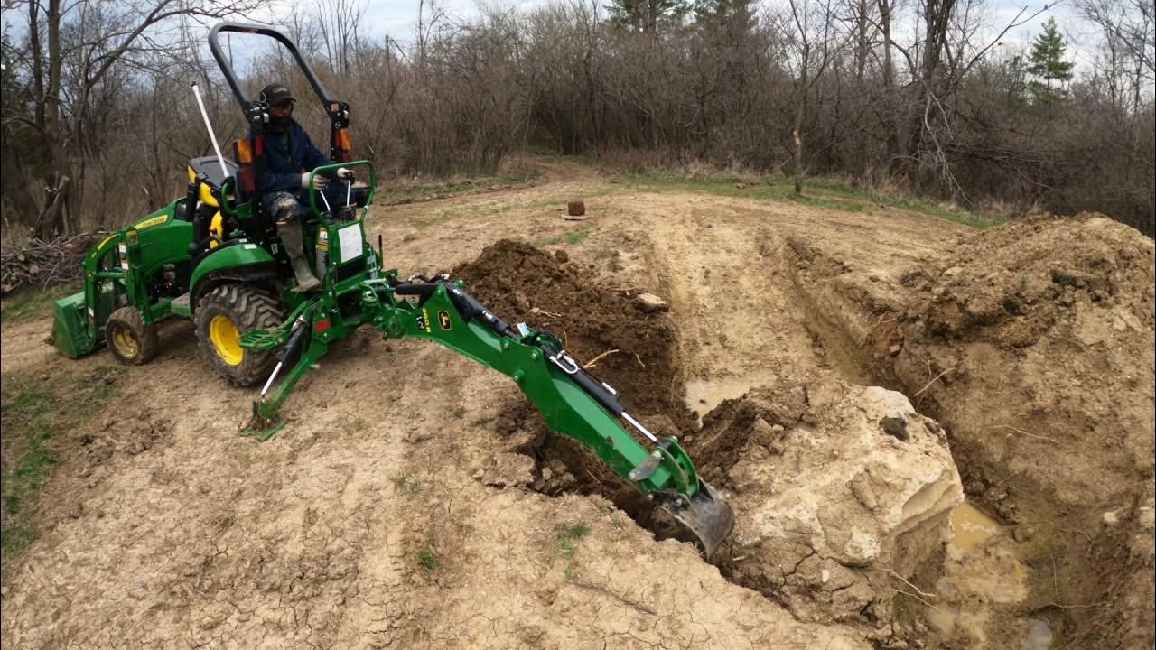 Penny And The Rock, 1025R, 260B Backhoe, Unstoppable Force Meets