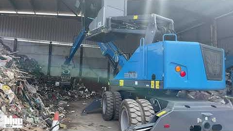 Fuchs MHL 310 Material Handler sorting waste for B and P Scrap