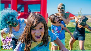 Play Zombie Tag in Giant Bounce House with Kate and Lilly!