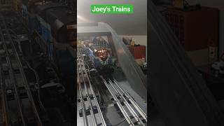 Lionel Trains on a tin- rail track layout!