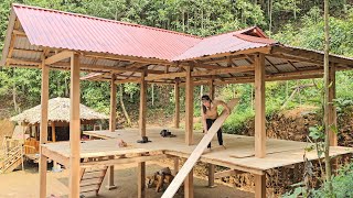 The girl built a wooden house - Planing wooden planks and making new floors