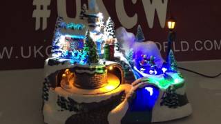 Animated Christmas Village Church Scene with Ice Skaters