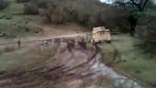 mrap in mud convoy