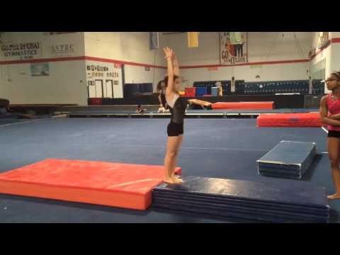 Standing full twisting back flip