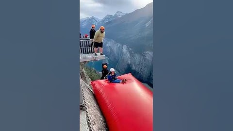 Cliff catapult is brutal! 😱💥 Guy jumps & launches friend into air #FunnyMoment #ExtremeChallenge