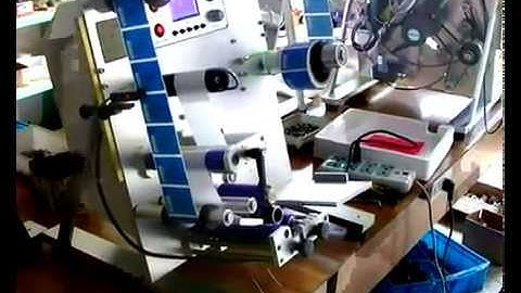Semi automatic labeling machine for round jars bottles vertical label equipment working video
