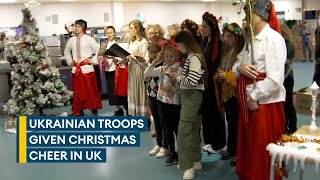UK troops give Ukrainian soldiers a festive send-off from training camp