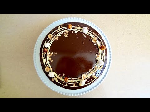 וִידֵאוֹ: עוגת שוקולד עם אגוזי לוז