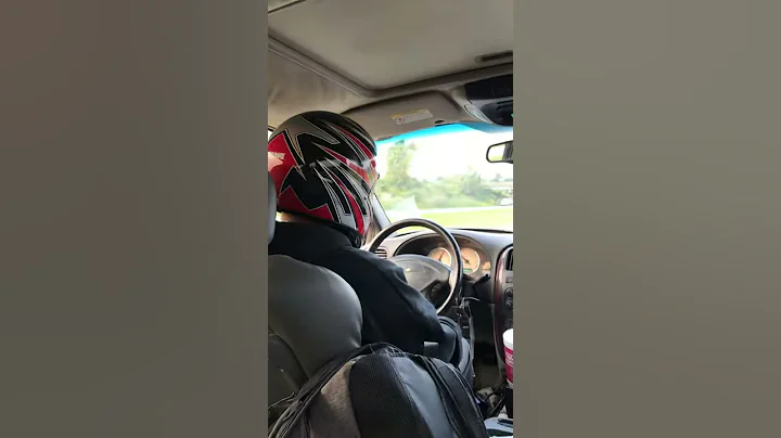 Corey Daly driving on i90 with a racing helmet