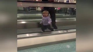 Cute Baby Vs Moving Walkway At Airport