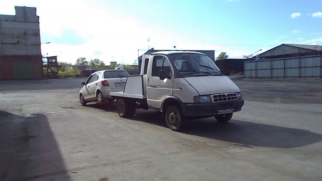 Эвакуатор с частичной погрузкой автомобиля газель