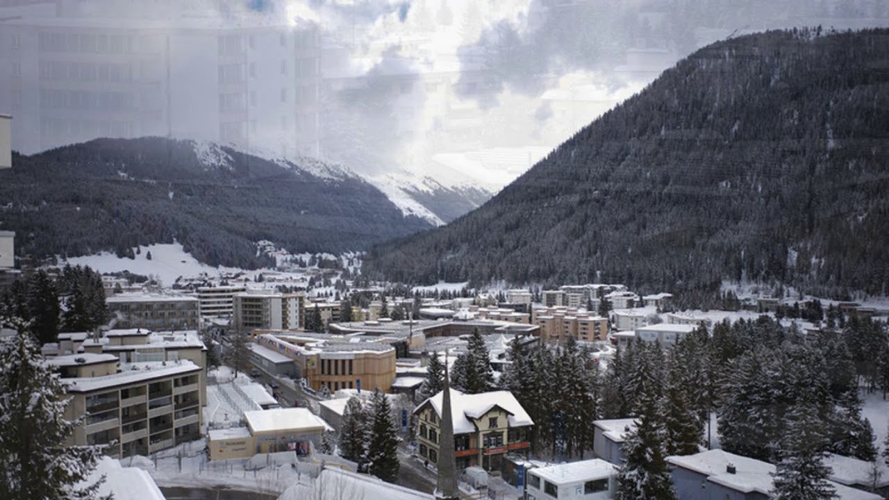 Davos bolsters security as protesters march toward venue