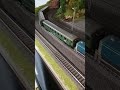 Bundesbahn Nahverkehr 212 mit Eilzugwagen und kleiner Güterzug