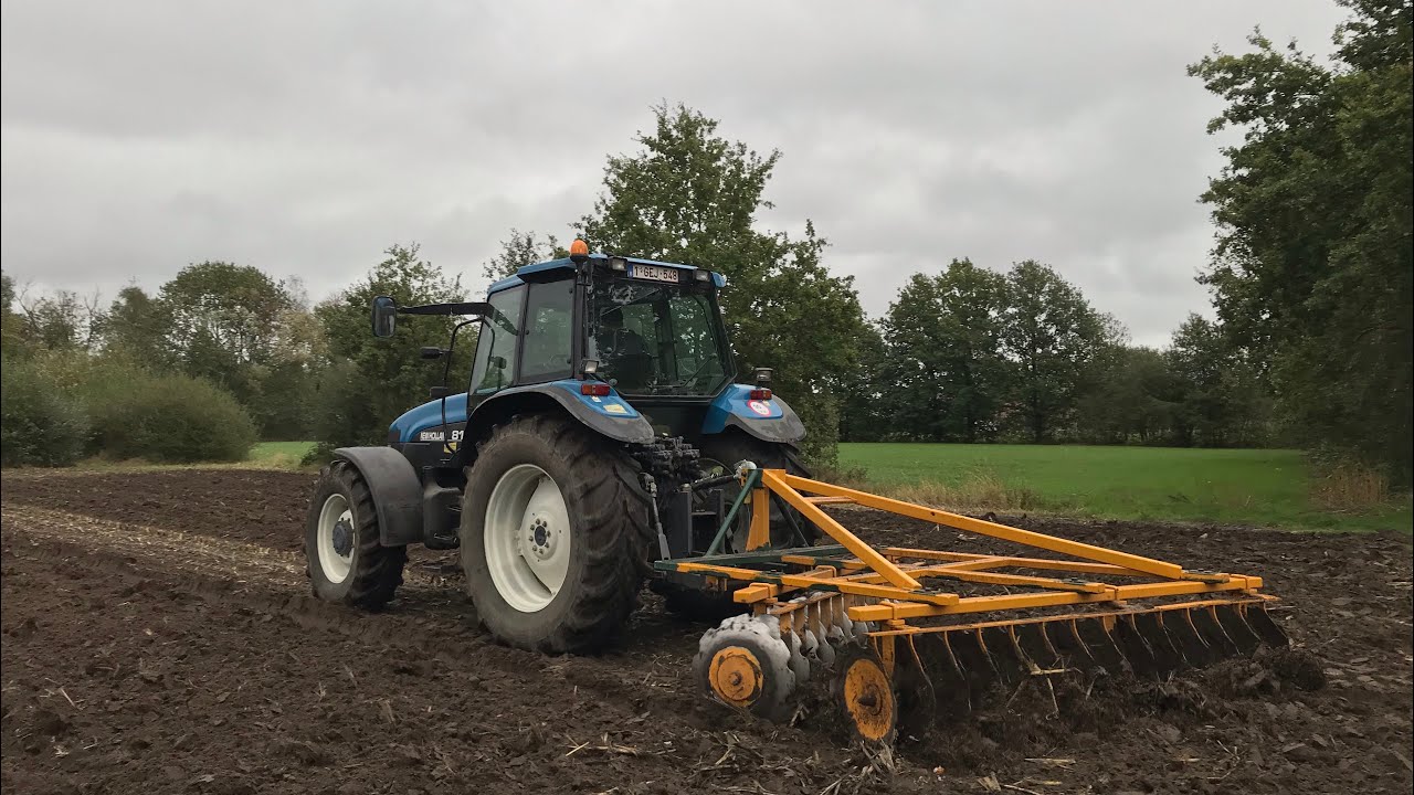 Schijven eggen met New Holland 8160 met schijven egg