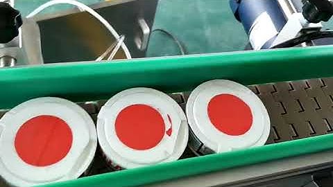 round jars top side labeling machine
