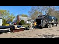 Garbage truck vs a massive bulk pile