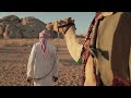 Bedouin crossing the desert with a camel خلفية مونتاج حيوانات-جمل-صحراء