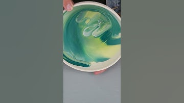Pouring underglazes on pottery!