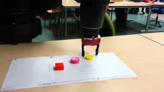 Baxter pick and place several objects by color