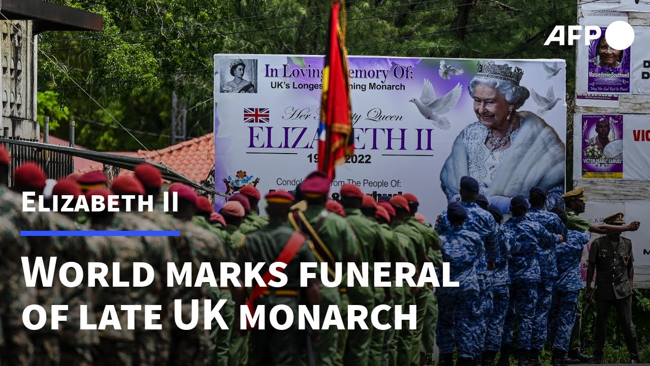 Mourners around the world mark the Queen's state funeral | AFP