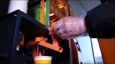 cup rotating orange juice vending machine