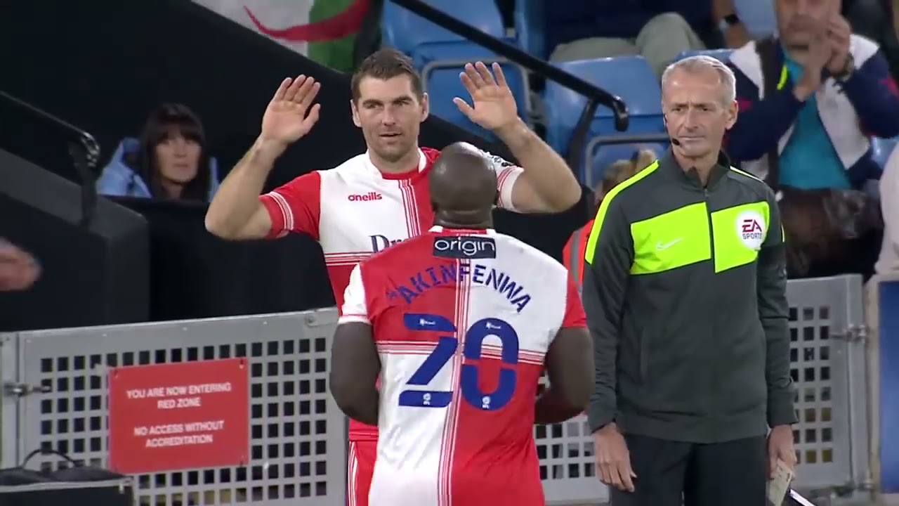 AKINFENWA received a standing ovation at the Man City vs Wycome Wanderers Game.