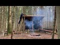 Building bushcraft shelter #2 [Solo overnight] Waterproof roof & campfire place  | Laavu shelter