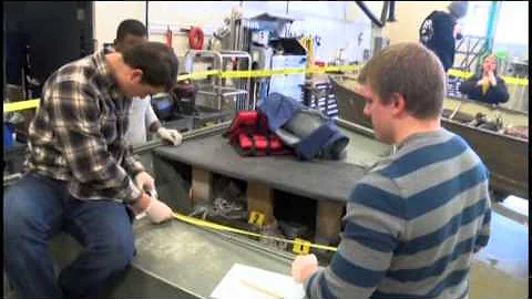 Criminal justice students process mock crime scenes with U.S. Coast Guard