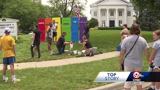 Community repaints doors in front of Kansas City church defaced with homophobic slur