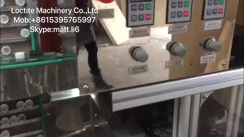 Plastic cap folding and slitting machine