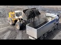 Caterpillar 988B Wheel Loader Loading Coal On Trucks