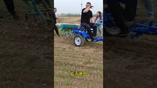The rear seat can carry a plow, seeder, and rake walking #tractor #wheatseeder