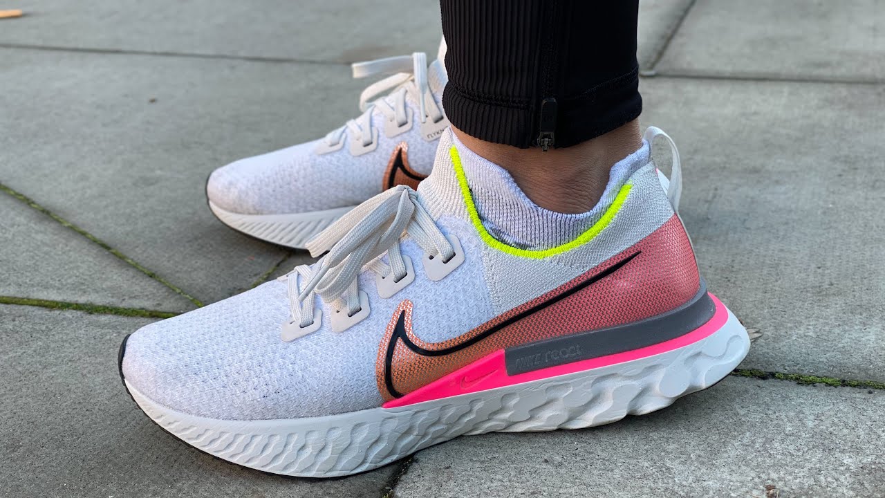 nike react infinity run platinum tint pink blast