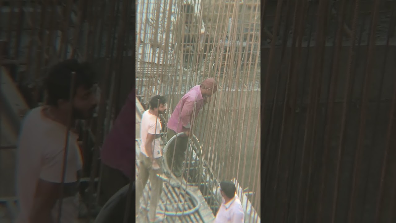 Using the vibrator to settle the concrete 