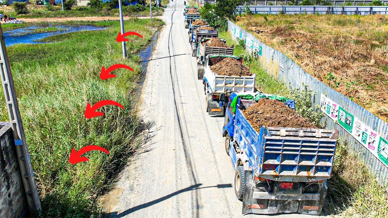 Excavation of New Project Filling Pond with Bulldozer Pushing Dirt