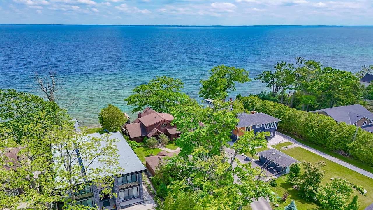 Lake Simcoe Waterfront Retreat | Custom Home with Boathouse & 75 Ft Shoreline