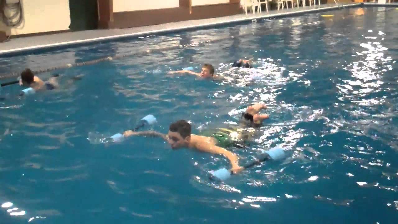 Burdenko Athlete Training - chest to back rolls with extended split legs athlete training near me