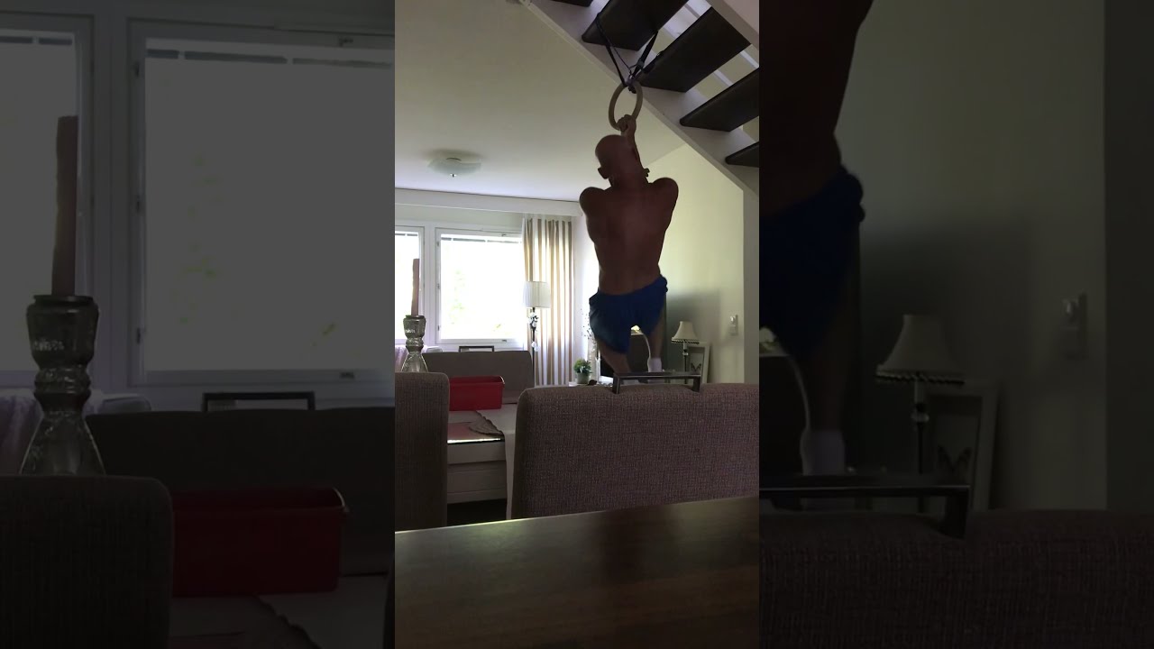 @54: One arm chin up x2 on rings