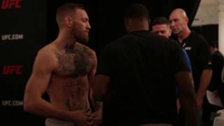 McGregor and Woodley Come Face to Face After Weigh Ins