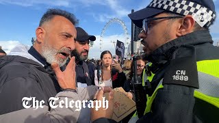 video: Watch: Police seize sign showing swastika at pro-Palestine march