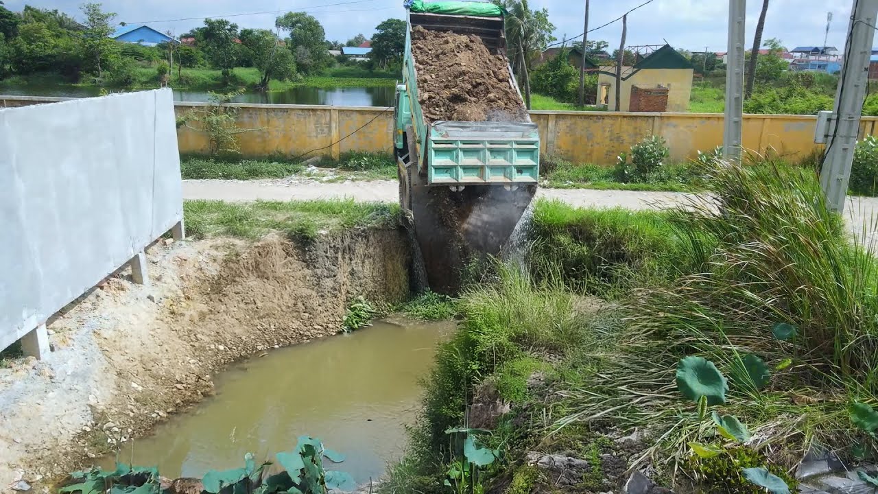 Dump Truck Earthmoving: Massive Soil Discharge into Rural Waterway for Landfill Project