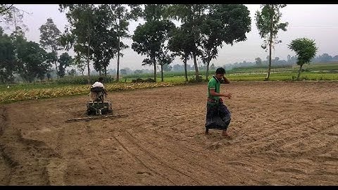 modern cultivation with small boy driving power tiller ||  mini  power tiller video