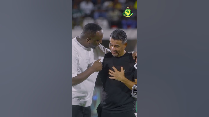 Rais Eng Hersi na Kocha la Makombe Hamdi Miloud.