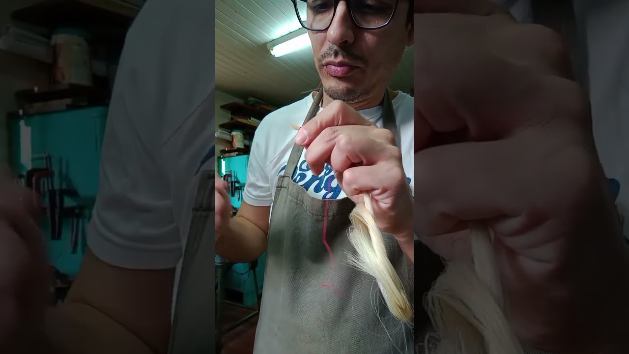 Encerdado o reencrinado de arco de violín