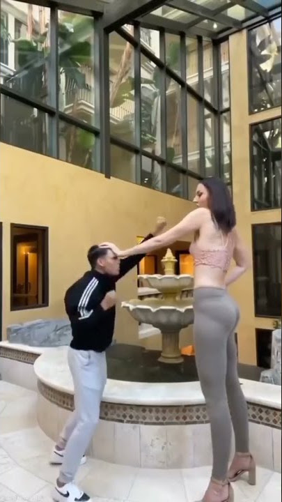 tall girl'fighting with boy